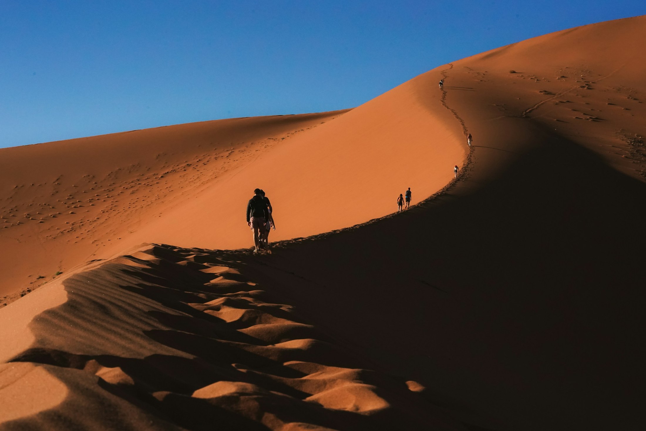 Walking into the dunes in Namibia